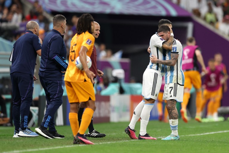 Argentina’s Leandro Paredes kicks ball into Netherlands bench after foul, gets Dutch ready to fight