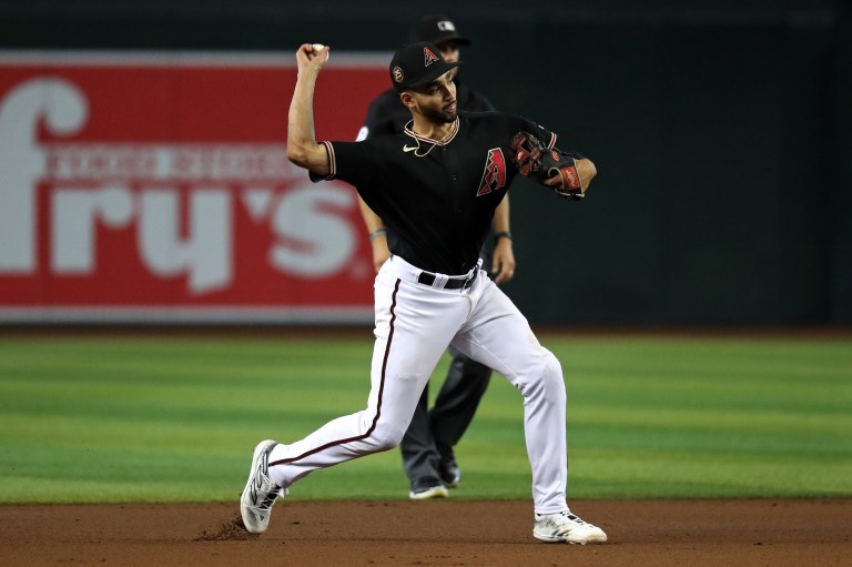 Who are starting pitchers for Diamondbacks vs. Brewers in Wild Card Round?