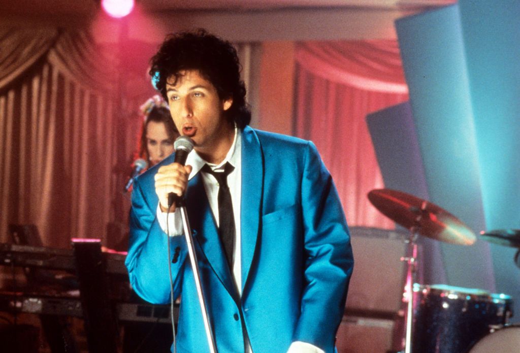 Adam Sandler sings in a scene from the film 'The Wedding Singer', 1998. (Photo by New Line Cinema/Getty Images)