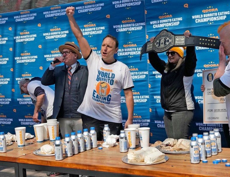 What is the record for most hot dogs eaten at the Nathan’s Hot Dog Eating Contest?