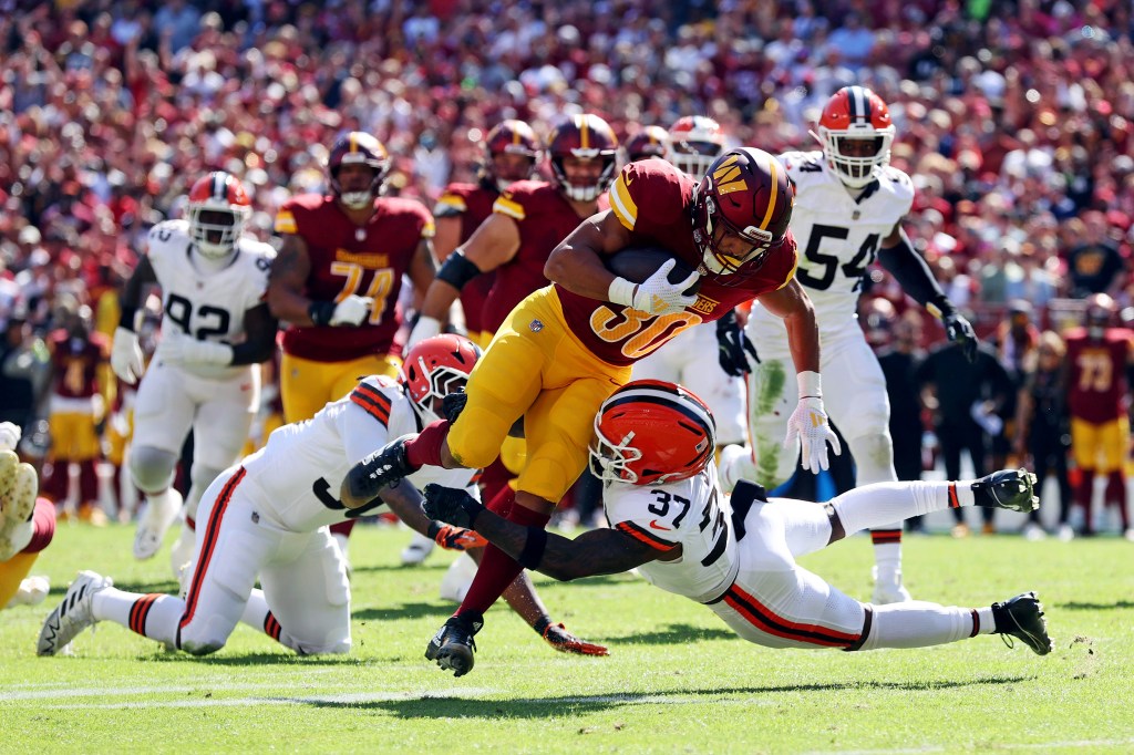 If Brian Robinson Jr. sits, is Austin Ekeler or Jeremy McNichols the better play?