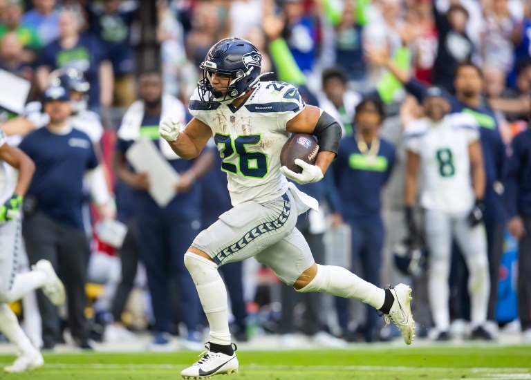 Should I start Zach Charbonnet if Kenneth Walker III is out?
